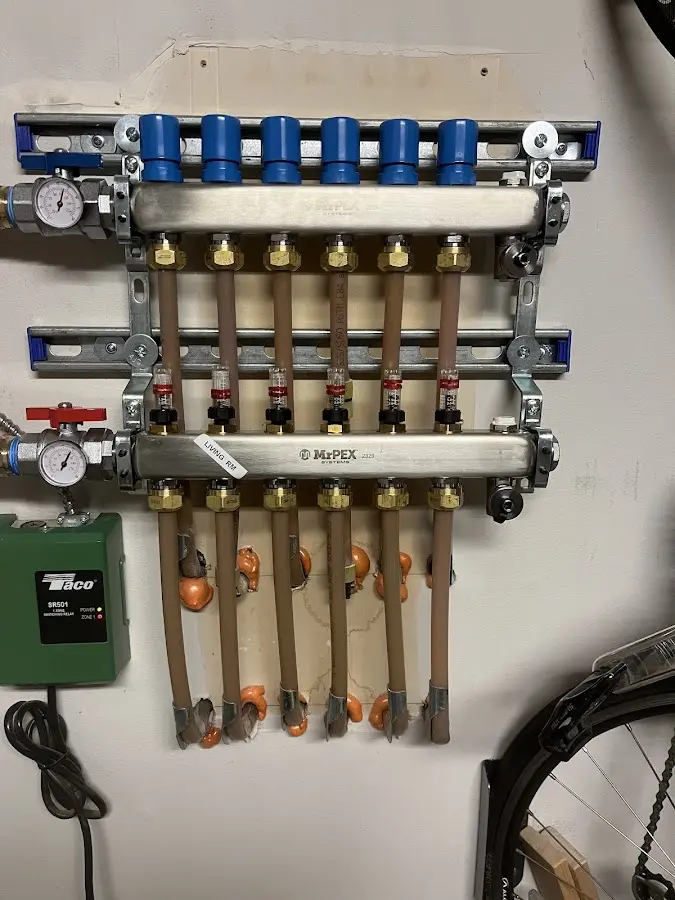 Plumber performing Water Heater Repair at a residential property in Federal Heights